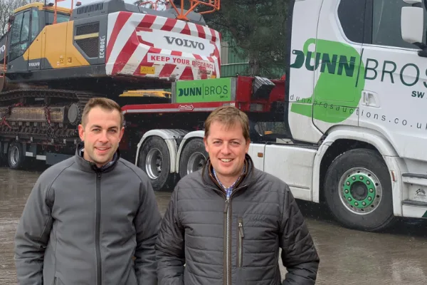 Tom and Joe Dunn in front of a Dunn Bros heavy haulage lorry